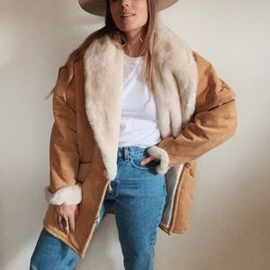 Leather and faux fur coat